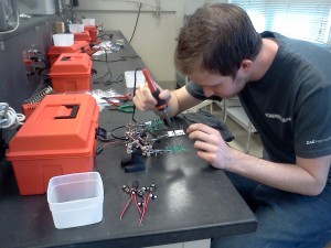 soldering at workbench