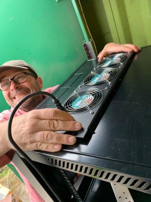 Dave installing the repeater fans
